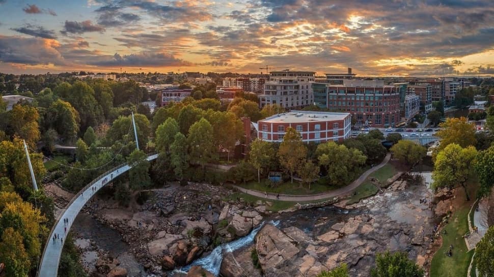 Liberty Bridge, Falls Park, and downtown Greenville at sunset